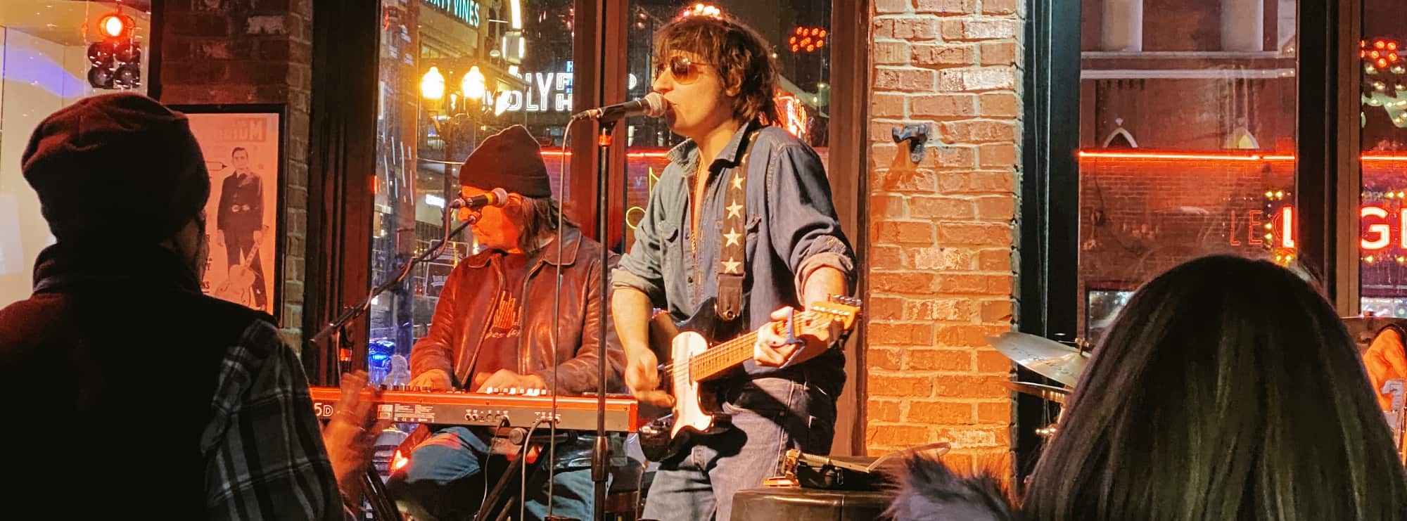 bar singer on guitar in Fort Wayne